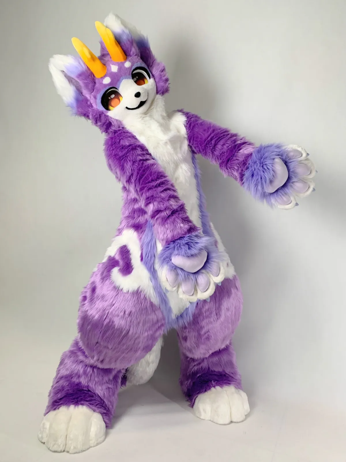 Purple, white & yellow horned fursuit