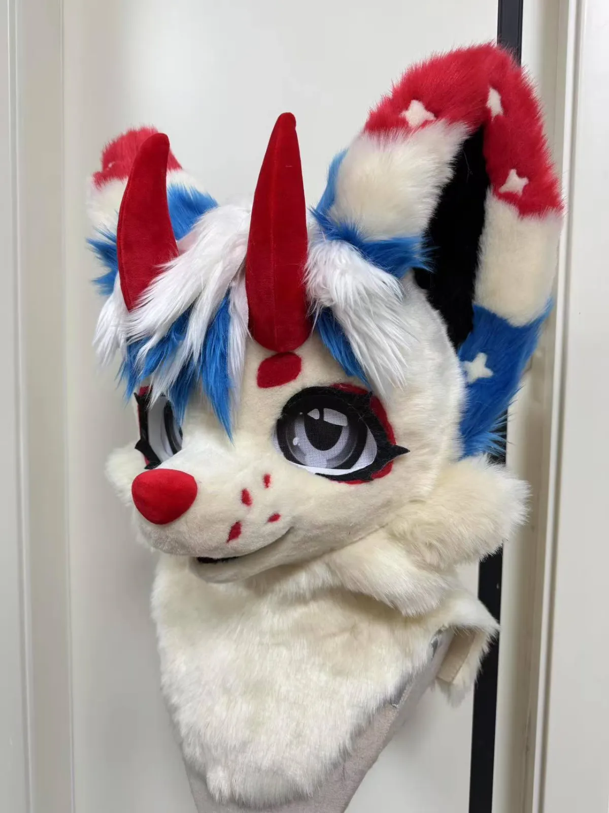 Red, white & blue horned head