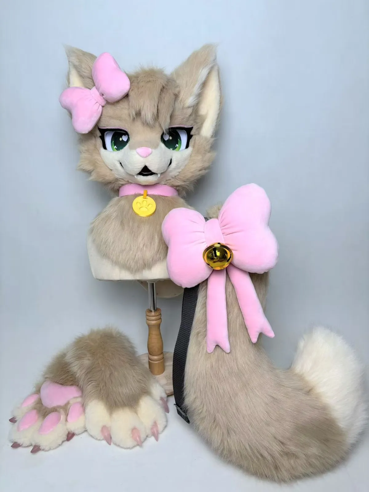 Milk-tea kitty fursuit with pink bow and bell