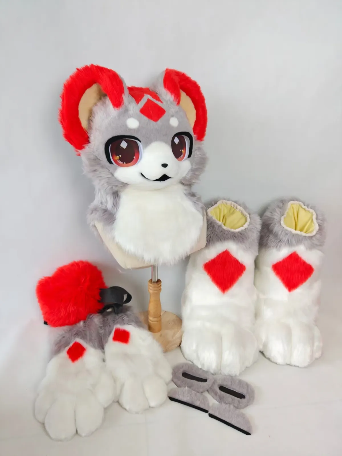 Grey & red ram-horn fursuit with diamond paws