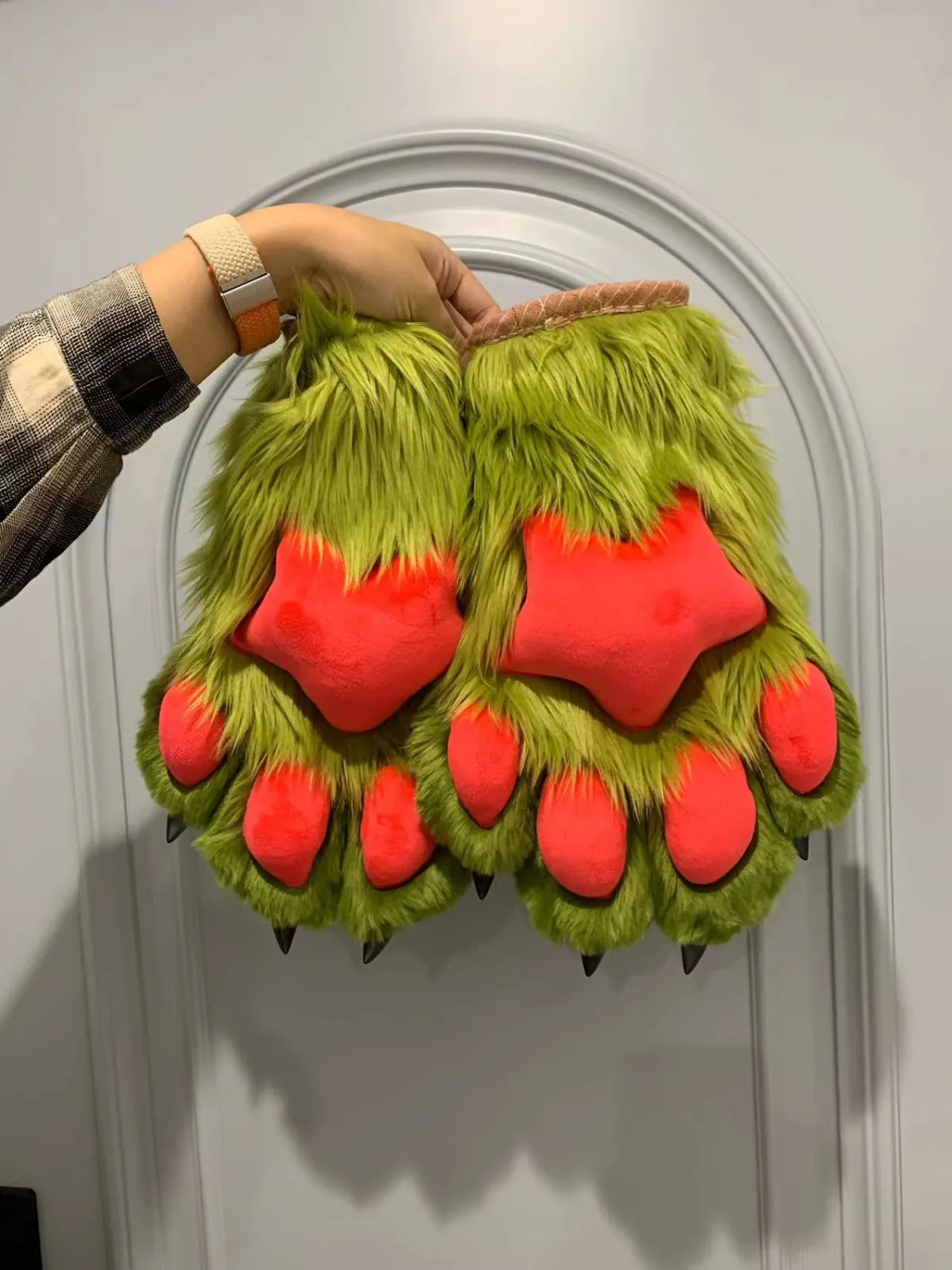 Green grinch paws with red star pads